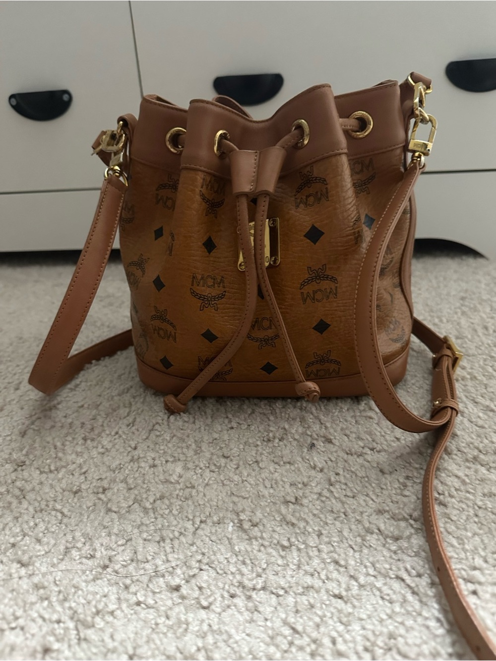 MCM cognac mini bucket sling bag